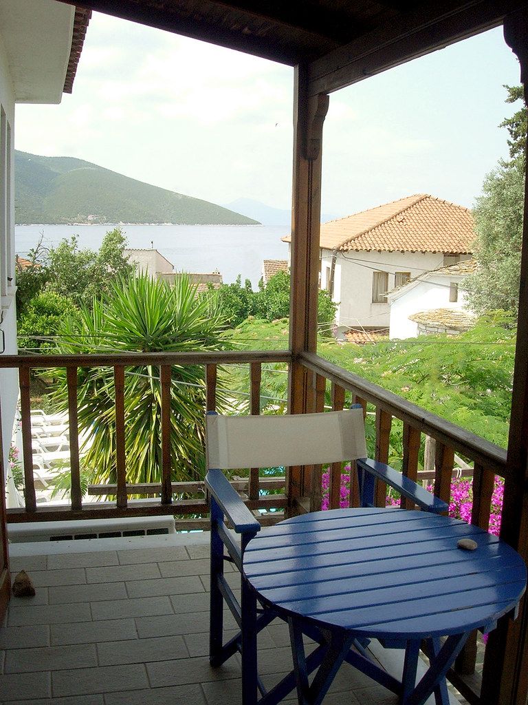 Balcony with table and sea view