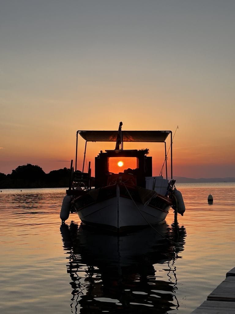 Fishing boat at sunset